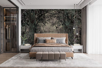 Dense forest with a dusky green wallpaper mural styled along a hallway feature wall near a console