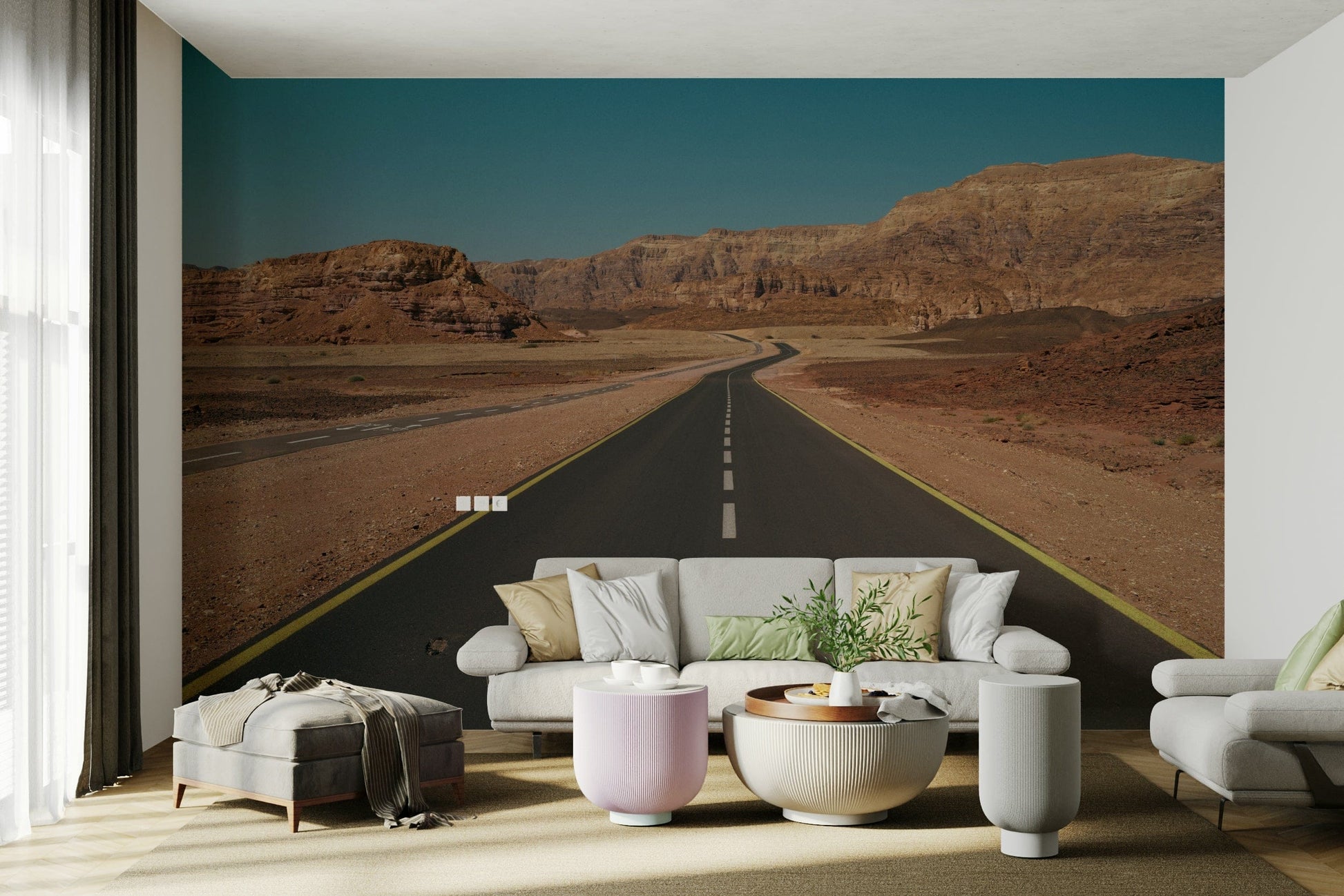 A living room featuring the desert road wall mural.

