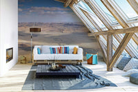 The sky is a clear blue or with some clouds.

