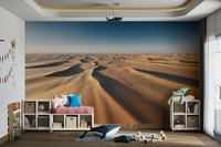 A wall mural of a peaceful desert landscape.

