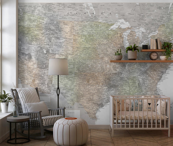 Detailed map of the USA with cities in muted watercolor wallpaper mural in a nursery with a crib and rocking chair