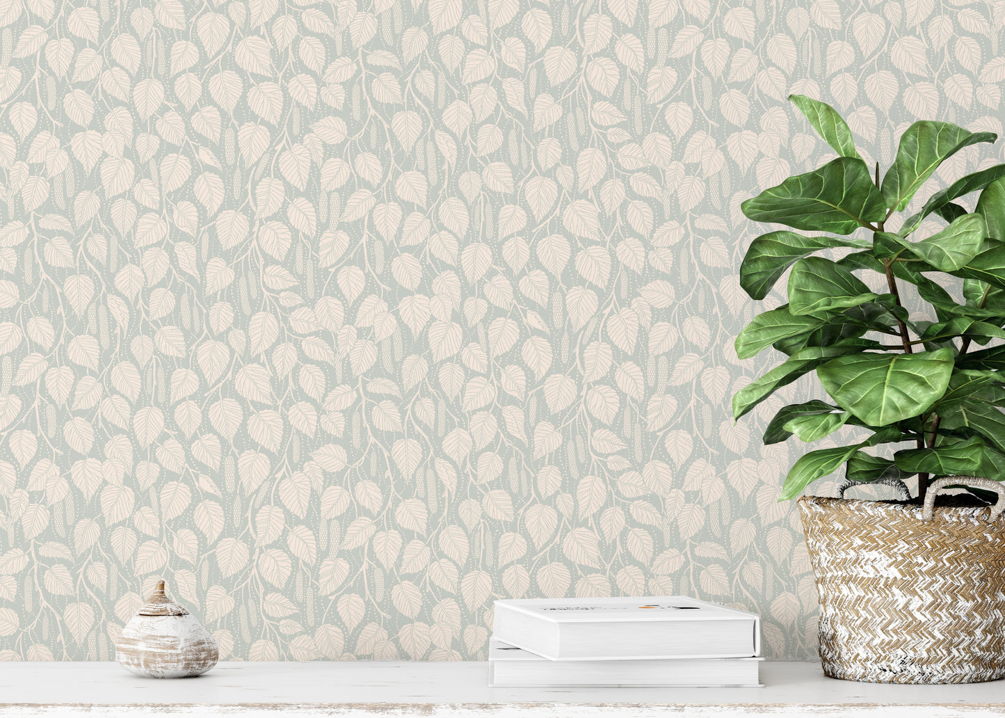 Dewy Birch Branches wallpaper in sage green behind a console with a fiddle-leaf fig in a woven basket