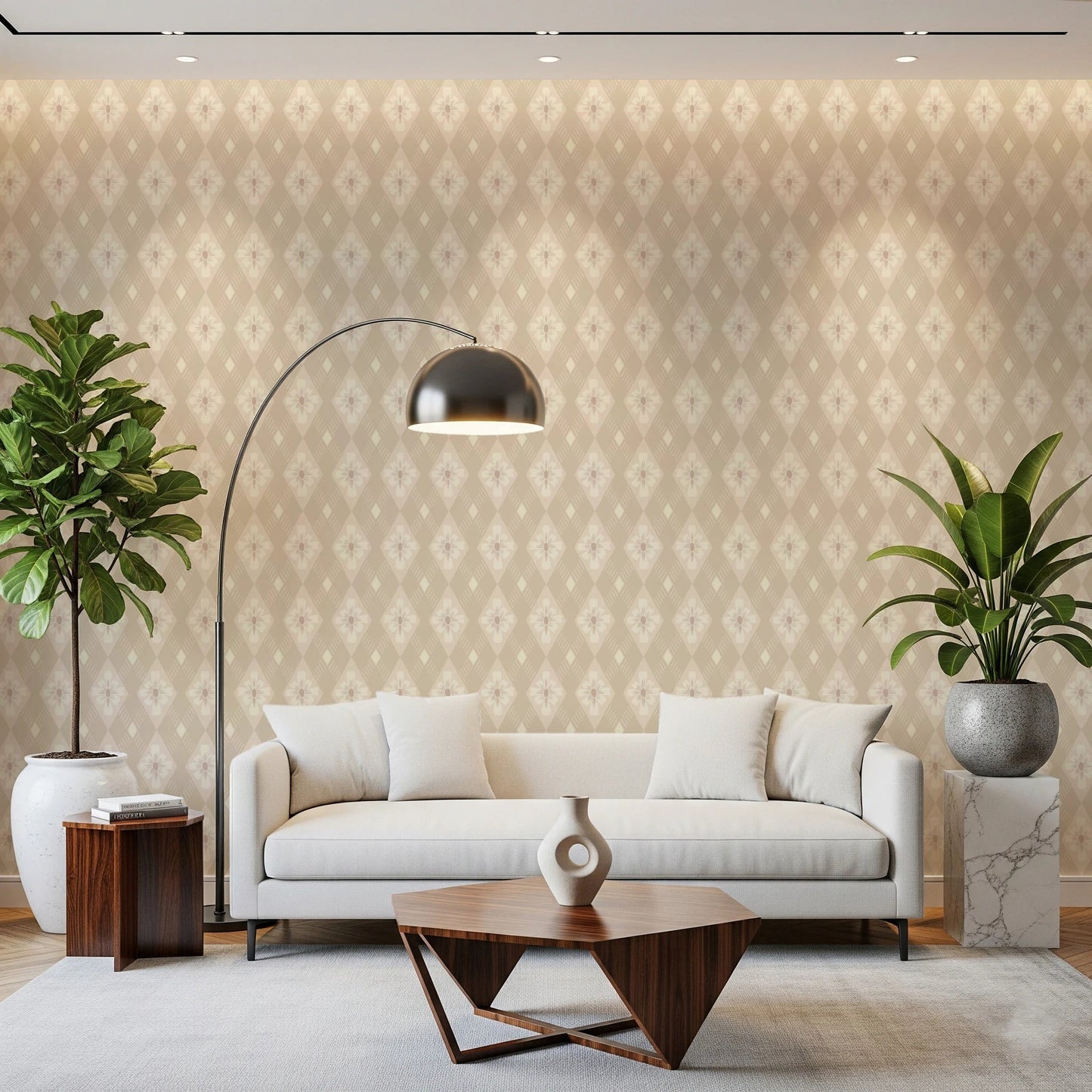 Diamond Bloom wallpaper with a neutral floral harlequin motif behind a white sofa and chrome arc lamp in a living room