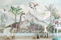Cretaceous Chronicles mural of dinosaurs and misty mountains behind a wooden toy pram and bunny chair in a child's room