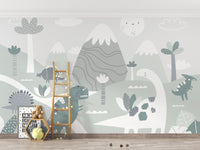 Dinosaur World Kids wallpaper mural styled as a feature wall behind a dining table and chairs in gray tones