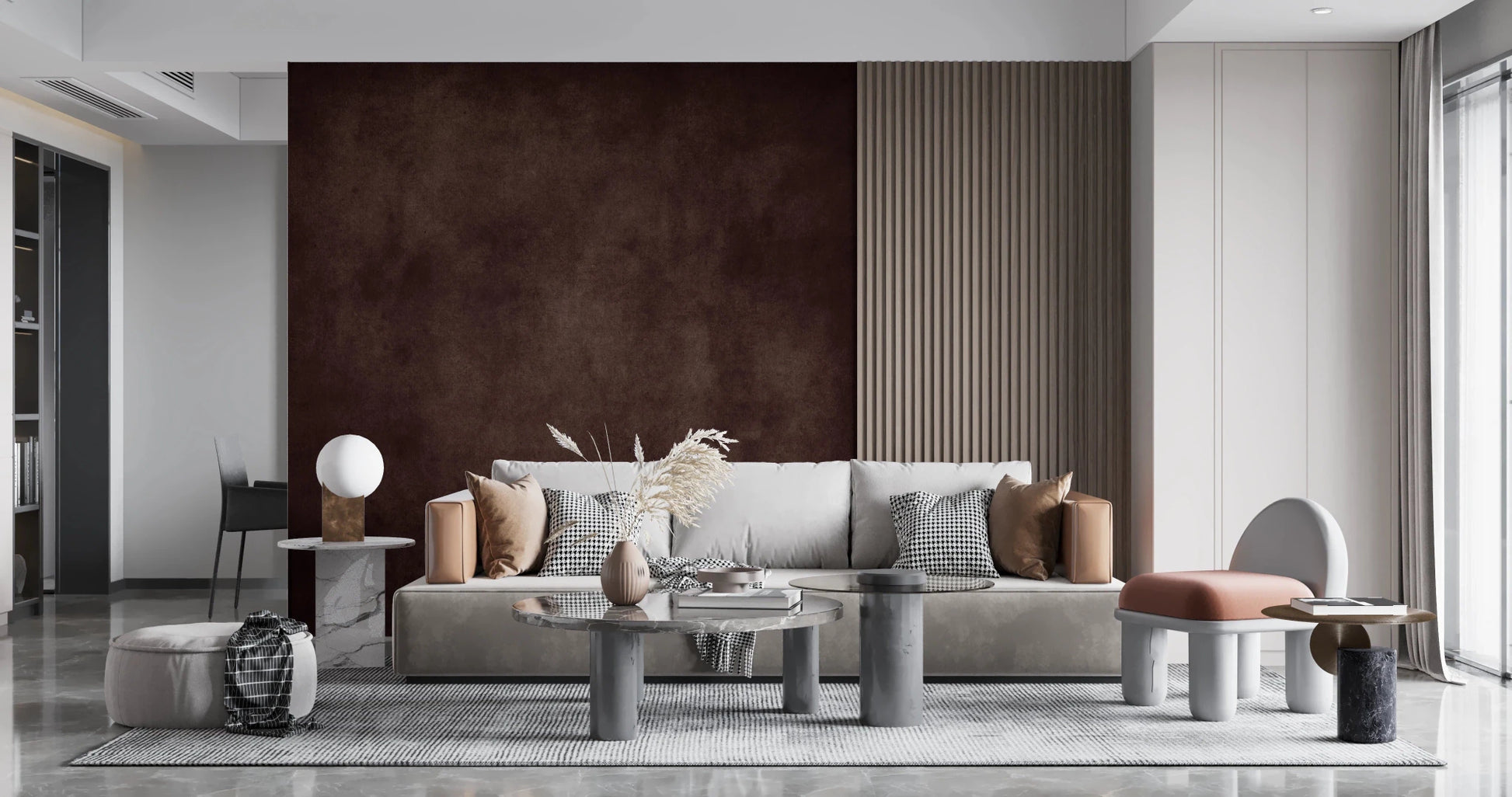 Dirty Paper Cognac wall mural in cognac brown framed by wood slats behind a grey sofa and pampas grass