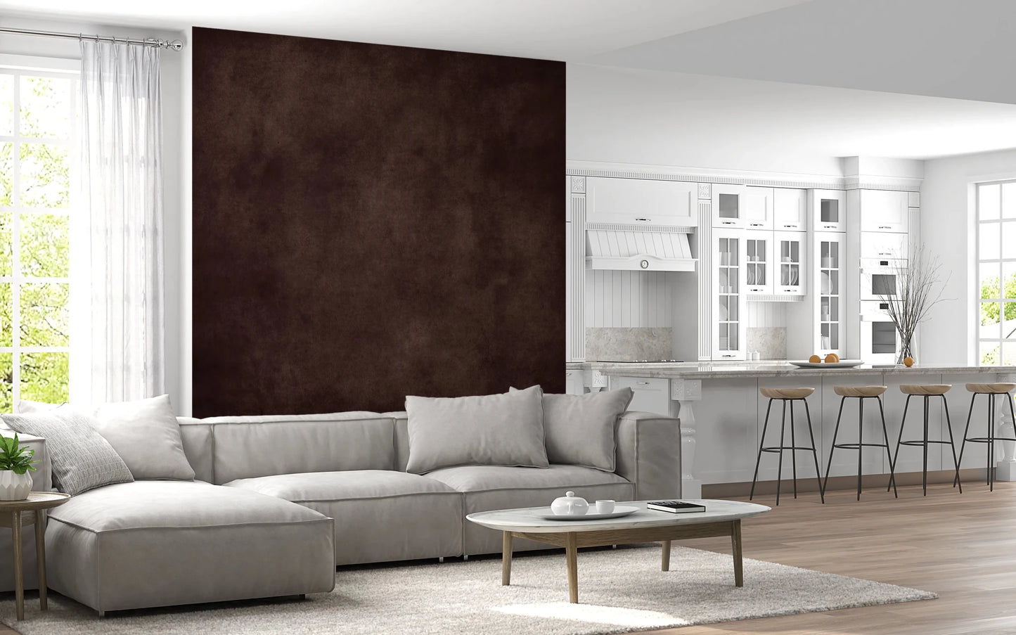 Dirty Paper Cognac wall mural in rich brown beside a white kitchen with bar stools and a grey sectional sofa