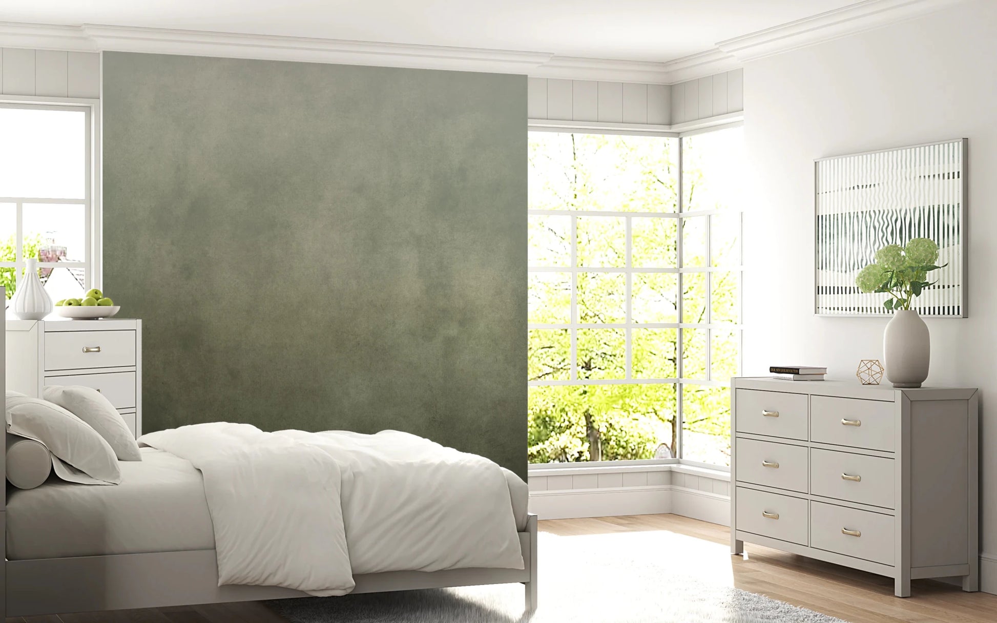 Ombre Sage wall mural behind a white bed in a bright bedroom with grey dresser and bay window