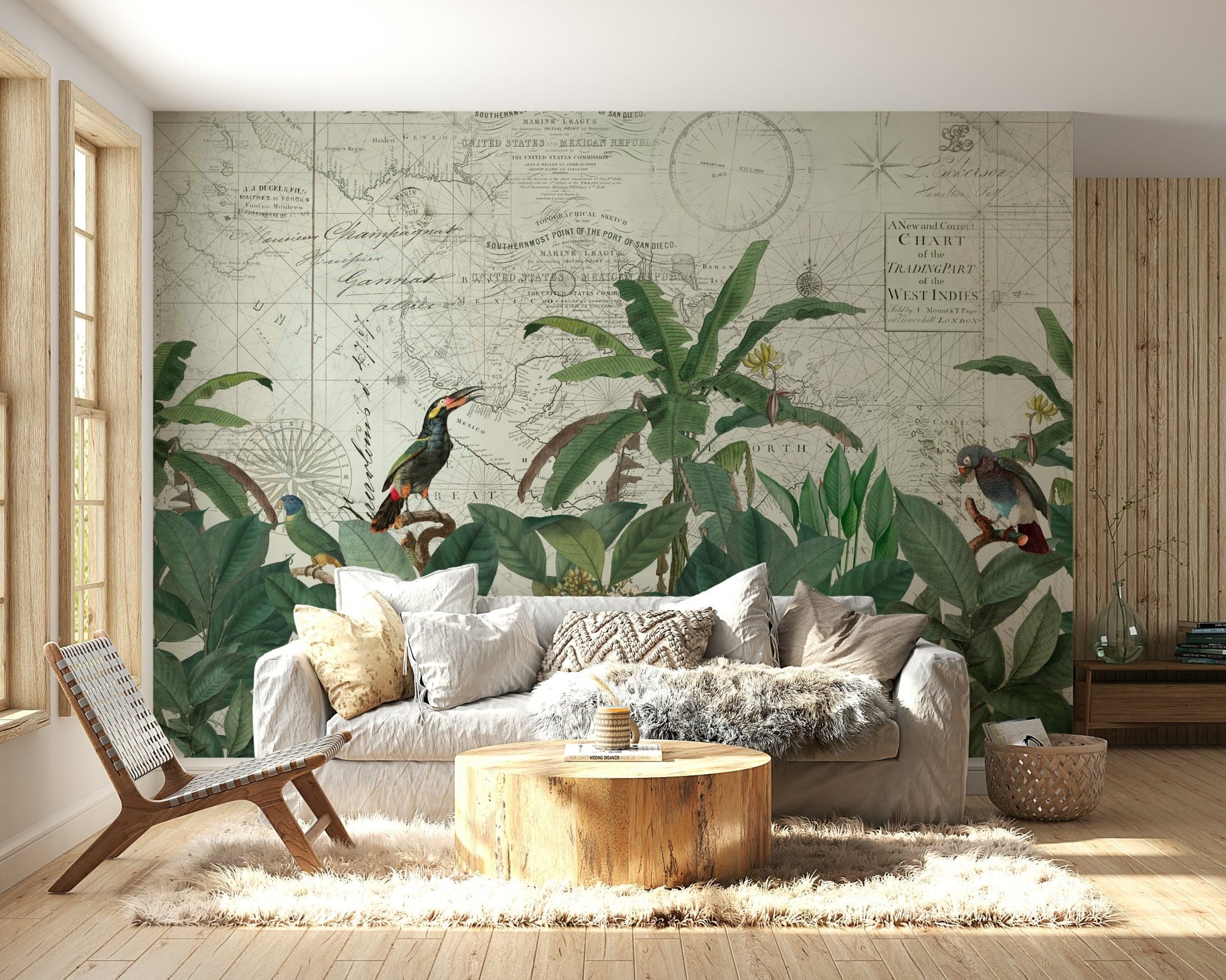Discover The Tropical Vintage World wallpaper mural of a West Indies chart with palms and toucans behind a white sofa