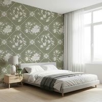 Soft floral geometric wallpaper in snug, muted colours with comfortable seating