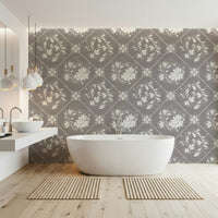Distressed tile floral wallpaper in laundry room, subtle pattern with bright, clean decor