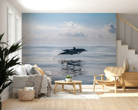 Modern home office with dolphin wall mural, ocean palette, calm wall decor backdrop