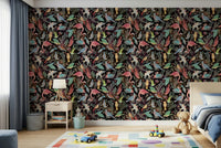 Dream Dark Birdwatcher's wallpaper of vivid birds behind a blue kids bed with a toy-car rug and teddy bear