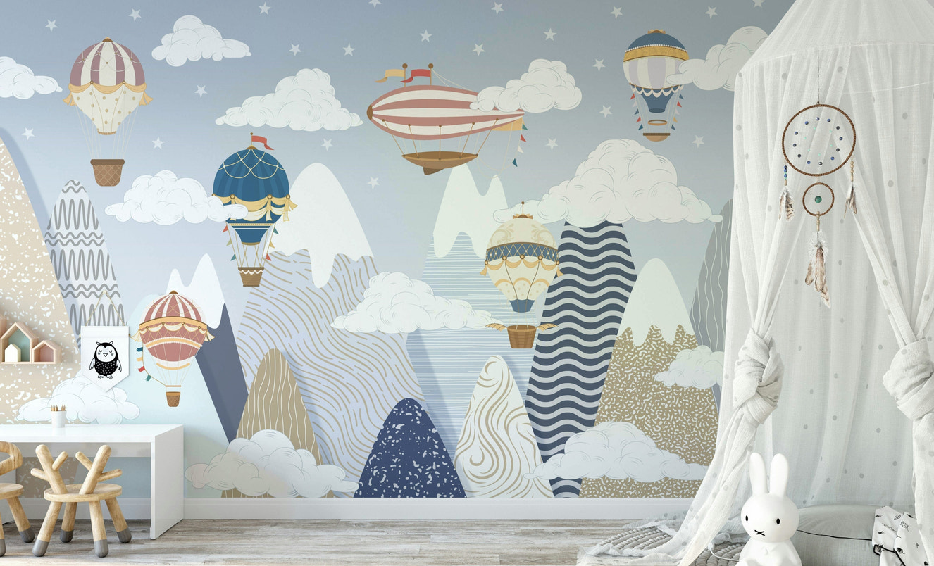 The design features hot air balloons and clouds.

