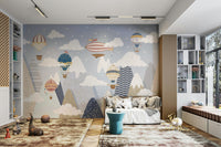 A peaceful wall mural with a whimsical sky scene.

