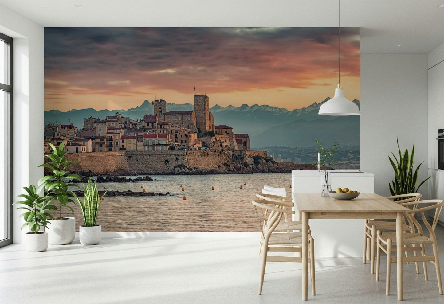 Mediterranean wall mural showing Antibes’ charming architecture silhouetted against a colorful dusk horizon.
