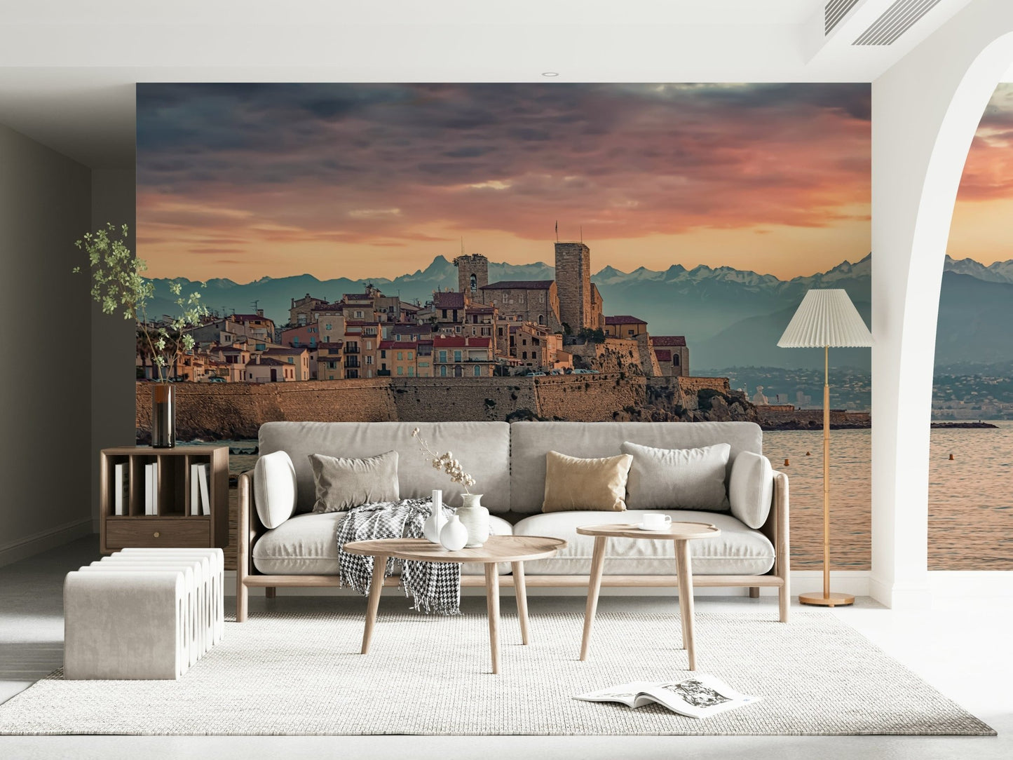 Mediterranean coastal mural capturing Antibes’ old town bathed in warm dusk light.