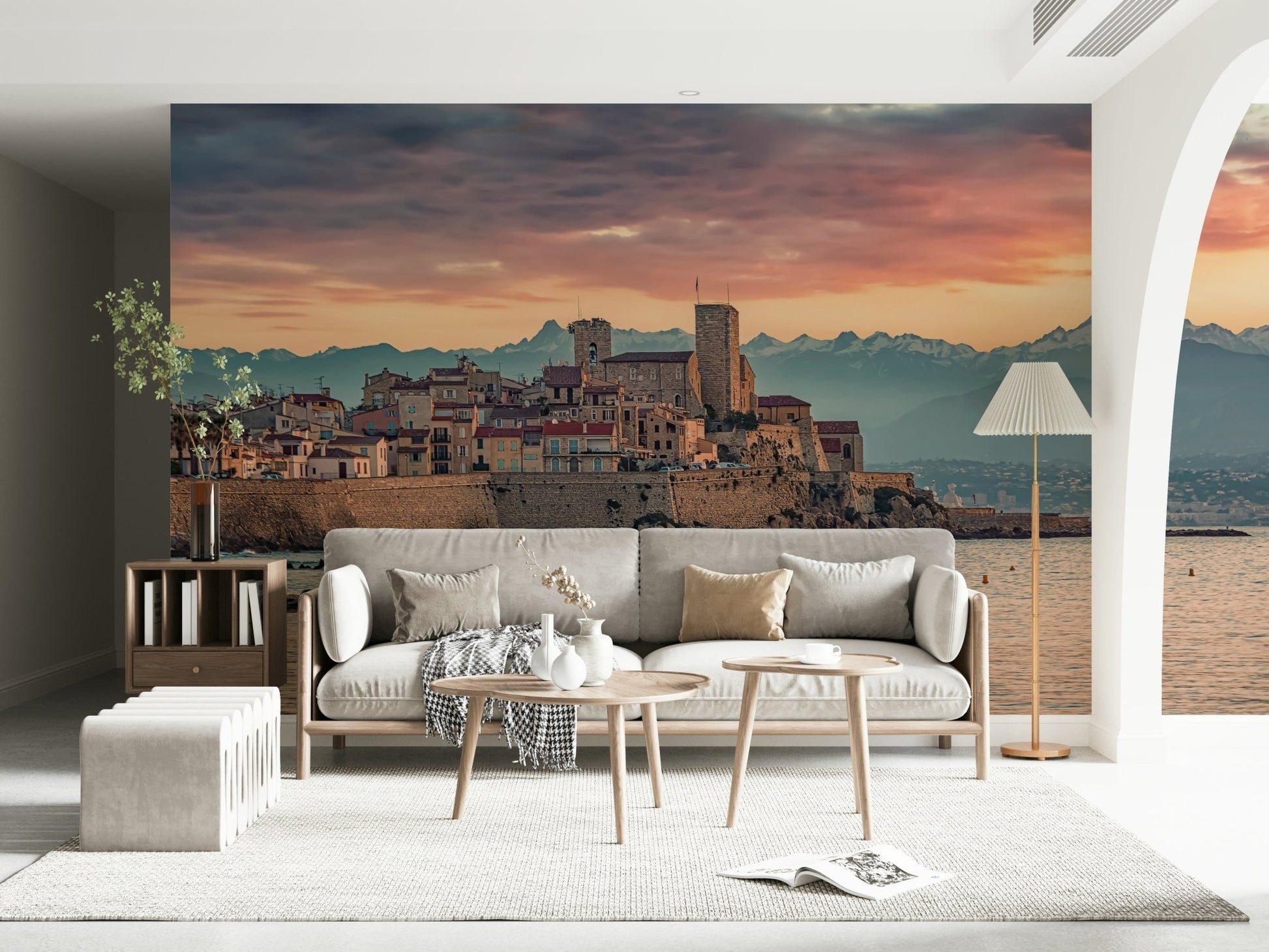 Mediterranean coastal mural capturing Antibes’ old town bathed in warm dusk light.