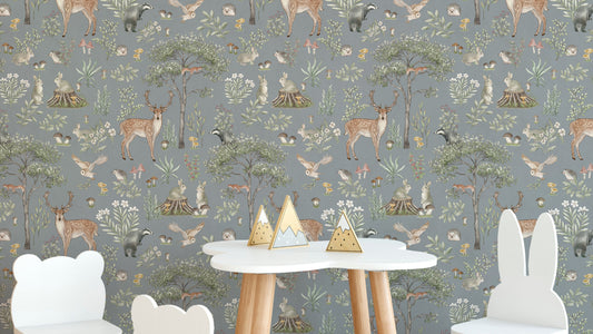 Dusty Blue Wildlife wallpaper with deer and owls behind a white cloud table with bear and bunny chairs