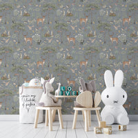 Dusty Blue Wildlife wallpaper in a play corner with a Miffy lamp, plush chairs and LOVE blocks