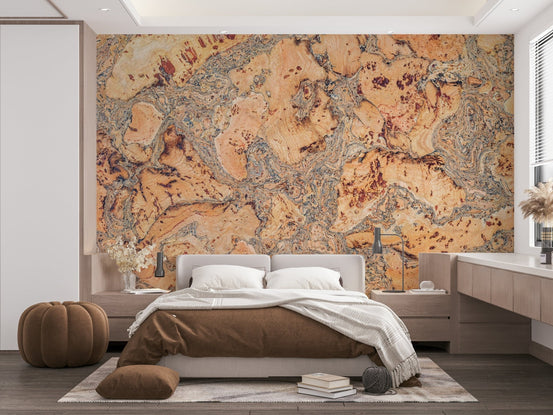 Earthy Cork Surface Design wallpaper mural in warm orange and grey mottled cork behind an upholstered bed in a bedroom