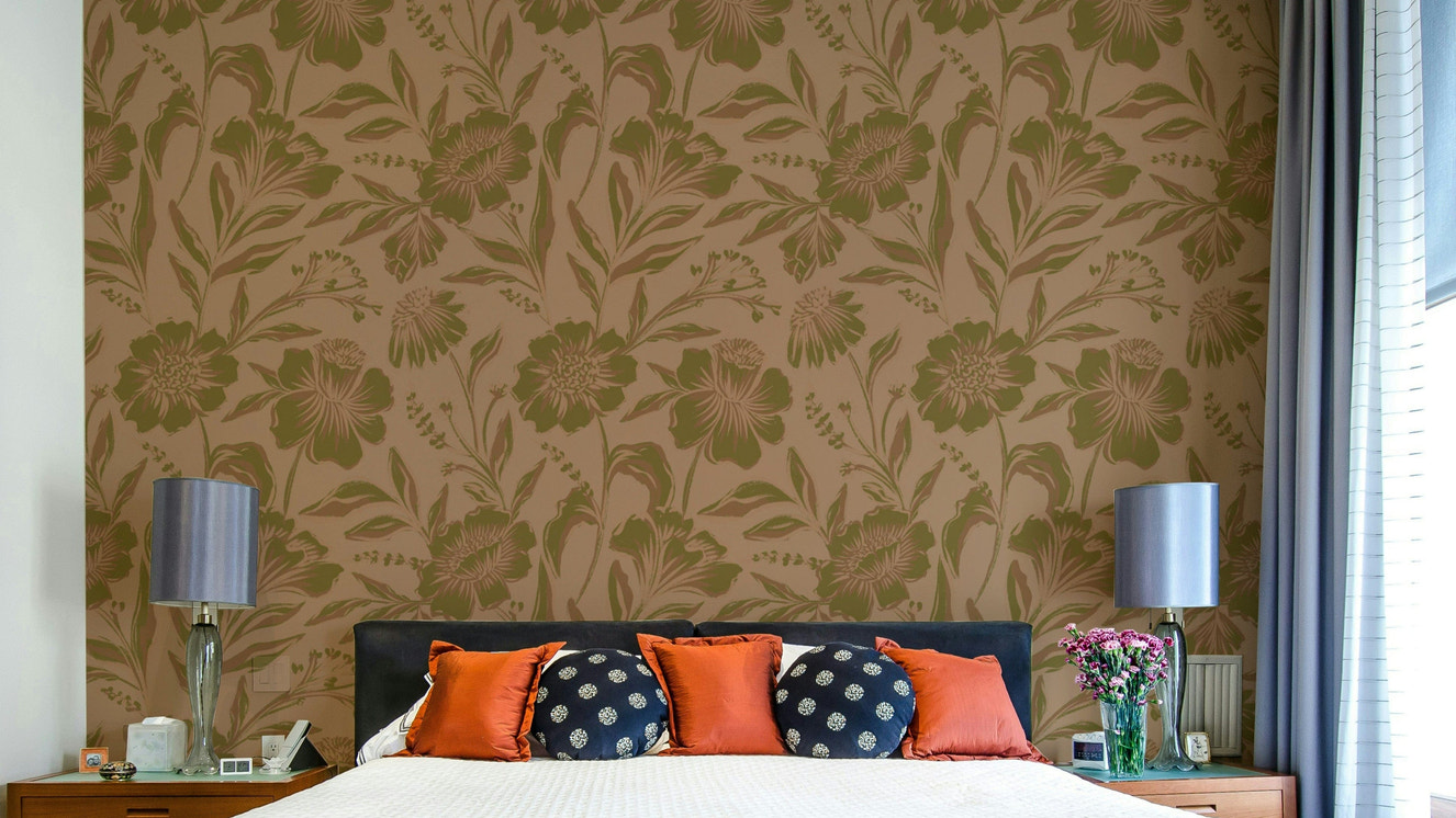 A full-wall mural showing a botanical pattern.
