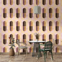 Earthy Geometric wallpaper with retro arches in a dining nook with a round table and rattan chairs