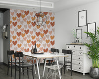 A playful wallpaper with terracotta and beige hearts arranged in a charming repeating design.