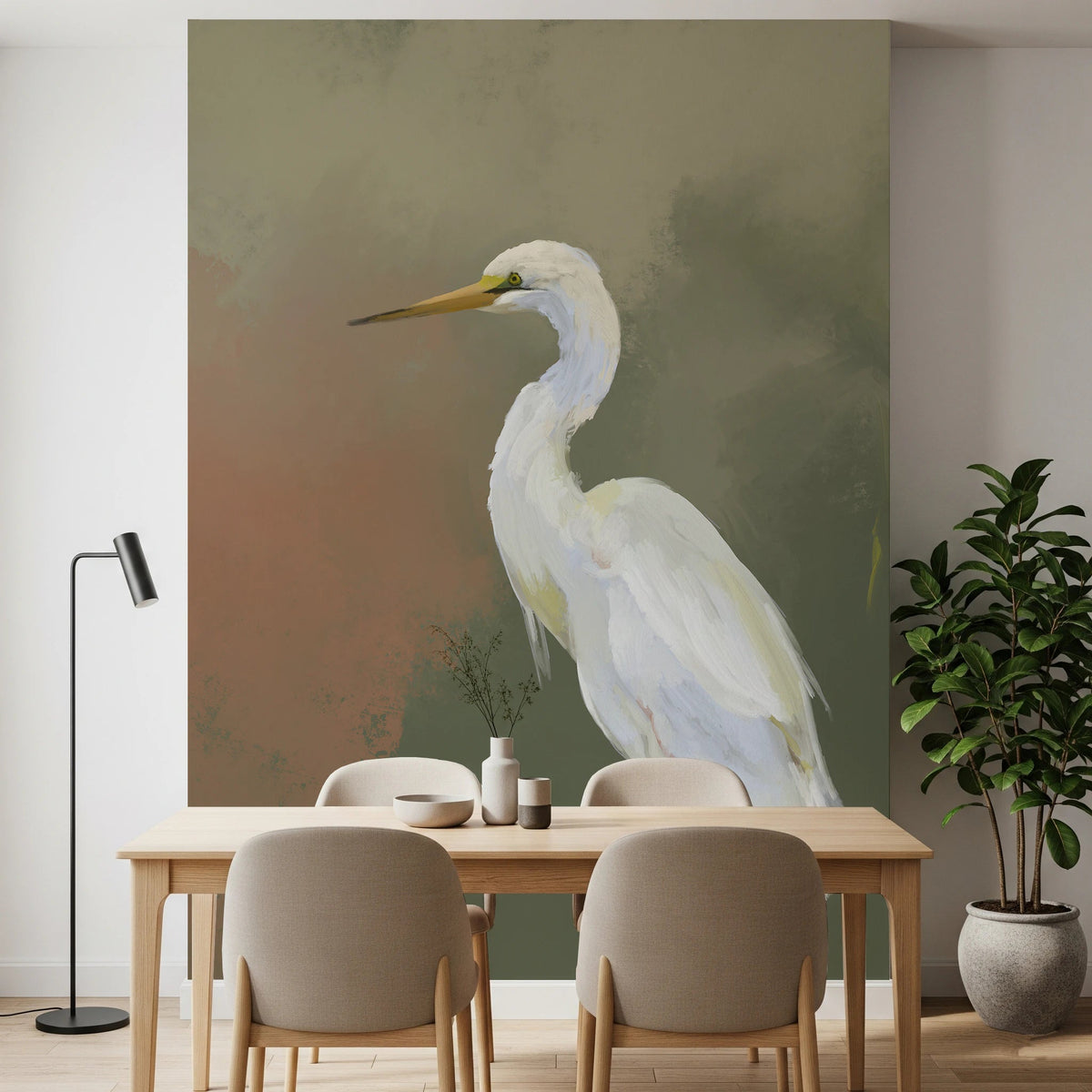 Egret Elegance mural of a white egret on olive green above a wood dining table with beige chairs