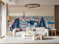 Eiffel Tower View wallpaper mural of the Paris rooftops and tower behind a white sofa under a round pendant in a living room