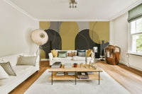 Soft geometric wall mural with grey and yellow arches

