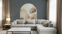 Elegant Floral Archway wallpaper mural on a navy wall behind a grey corner sectional and white marble coffee table