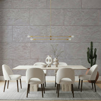 Neutral-toned stone block mural with layered textures creating a calm and stylish ambiance.