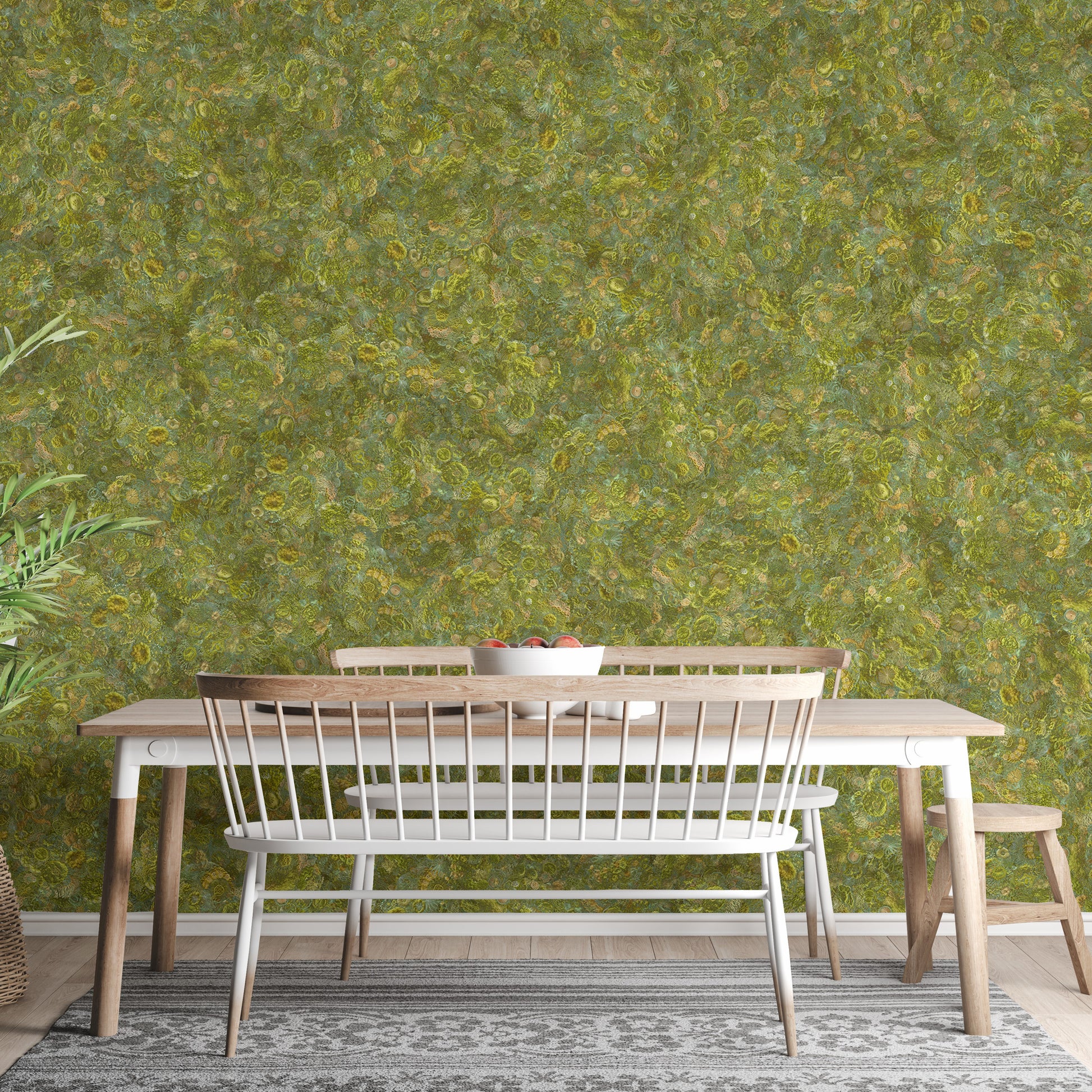 Embroidery Moss Green Color wallpaper mural as a dining room wall behind a white and wood table with bench seating