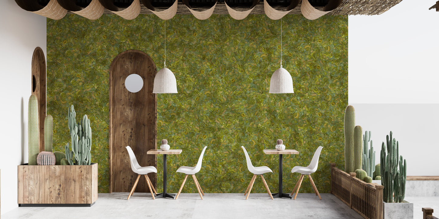 Embroidery Moss Green Color wallpaper mural covering a cafe patio wall with white chairs, wood tables and potted cacti