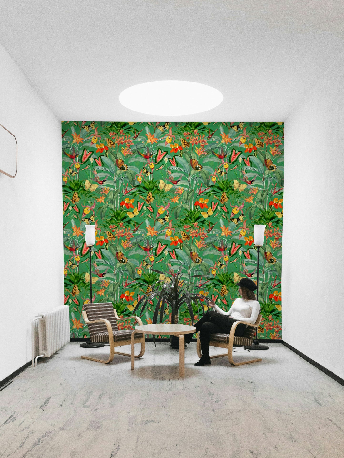 Lush tropical plants and bold emerald tones in wallpaper for walls

