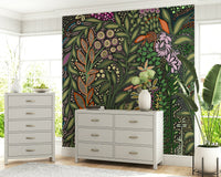 Wall mural with vibrant tropical Strelitzia leaves and flowers for an exotic interior feel.