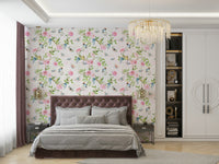 Wallpaper showing birds perched among flowers and leaves.

