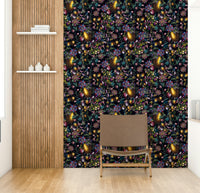 Serene wall mural with soft, delicate blooms and rich greenery.

