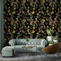 Jungle-inspired mural with monkeys, colorful blossoms, and rich foliage.

