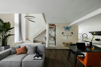 Artistic wall mural with fluttering butterfly patterns

