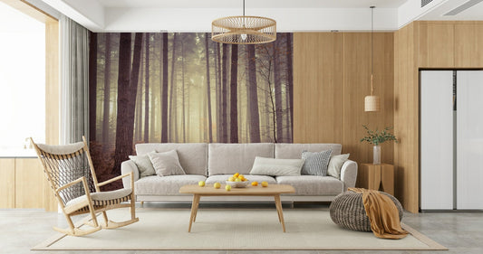 Forest wall mural behind sofa in apartment, moody woodland scene, green and gray tones