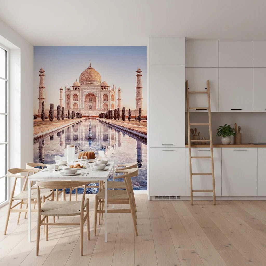 Eternal Taj wallpaper mural of the golden Taj Mahal in a white kitchen with a dining table and wishbone chairs