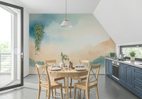 Home office with a bright sky-themed wall mural backdrop.