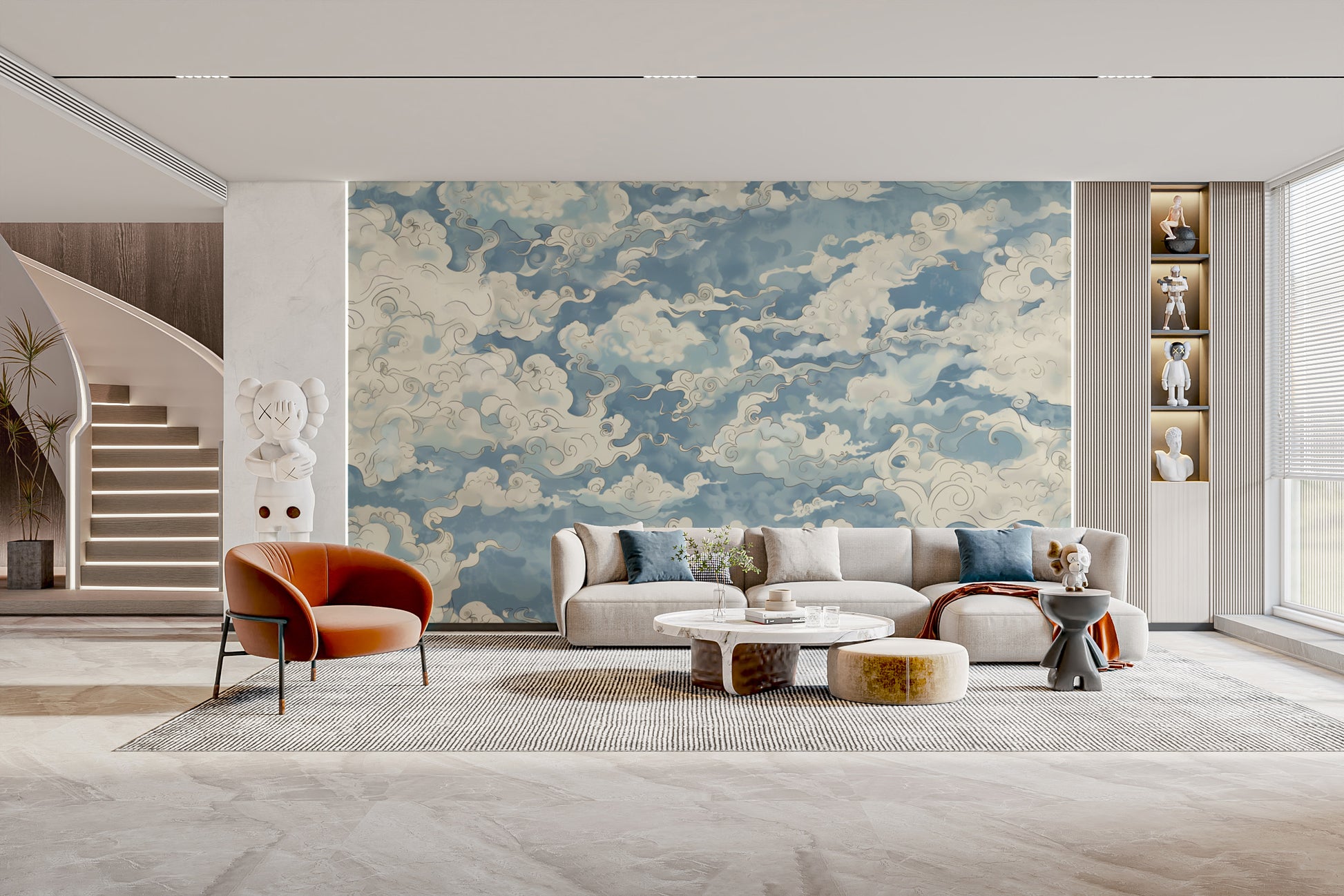 Ethereal Drift Cloud wallpaper of swirling blue clouds above a cream sectional and rust armchair in a living room