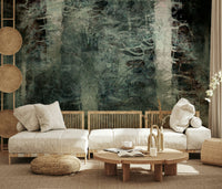 Ethereal Forest Dream wallpaper mural of dark forest behind low linen sofas in a calm Japandi living room