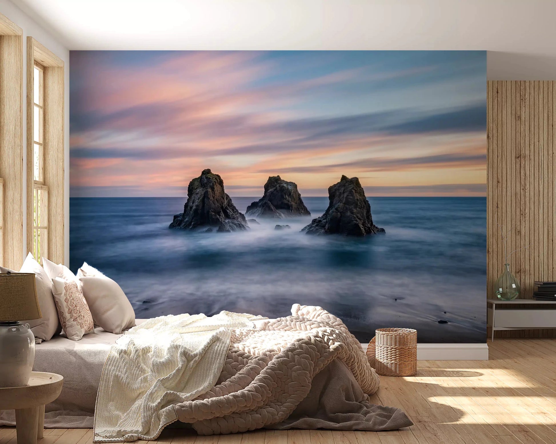 Ethereal ocean rocks wall mural with pastel clouds and smooth long-exposure water