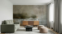 Ethereal Shoreline wallpaper mural on a wall behind a green sofa, wood sideboard and beige poufs in a living room