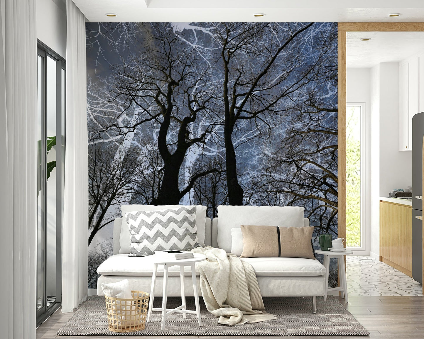 Ethereal Tree Silhouette wall mural of dark trees behind a white sofa with grey chevron and tan pillows
