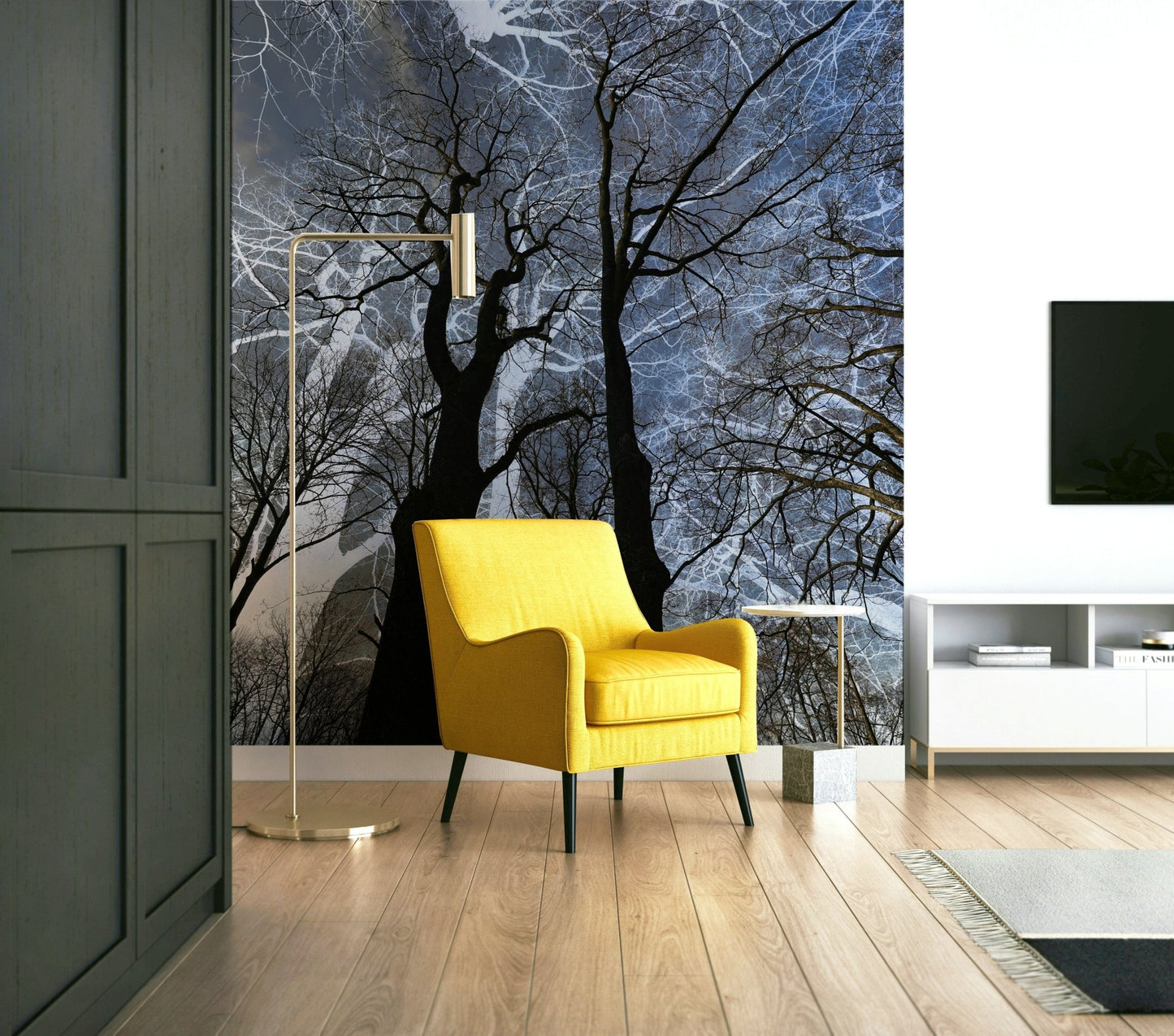 Ethereal Tree Silhouette wall mural of dark trees behind a yellow armchair and brass floor lamp